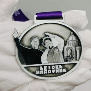 Medaille Leiden Marathon met Armin van Buuren en Jochem Myjer